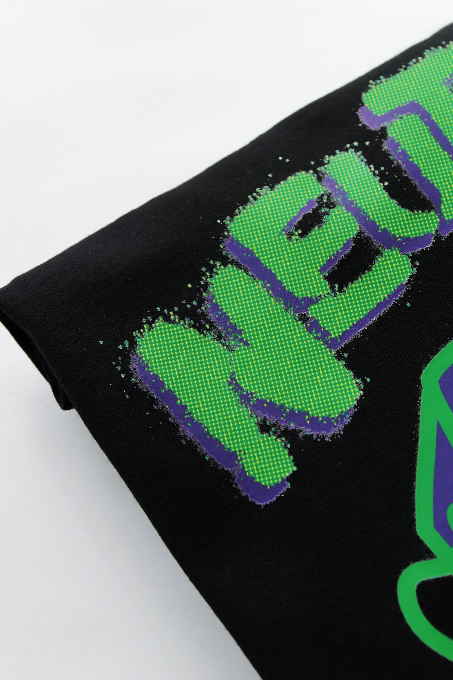 NEUTRINO MERCH-/INDUMENTARIA